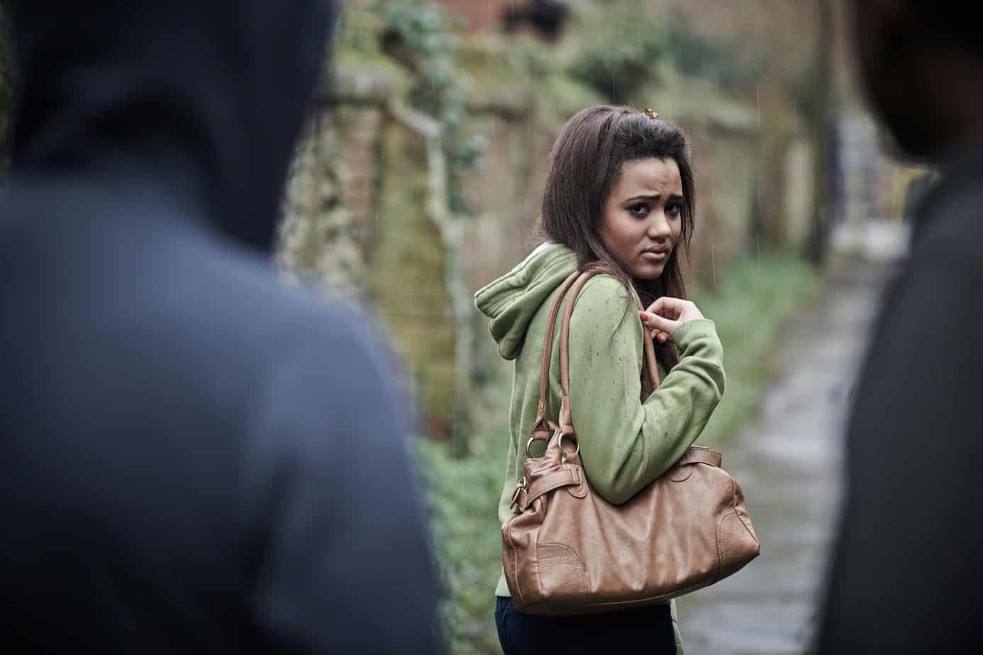 Teenage Girl Feeling Intimidated As She Walks Home